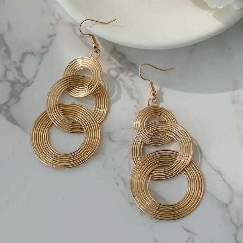 Triple-circle-earrings-no28636-museclothing-1