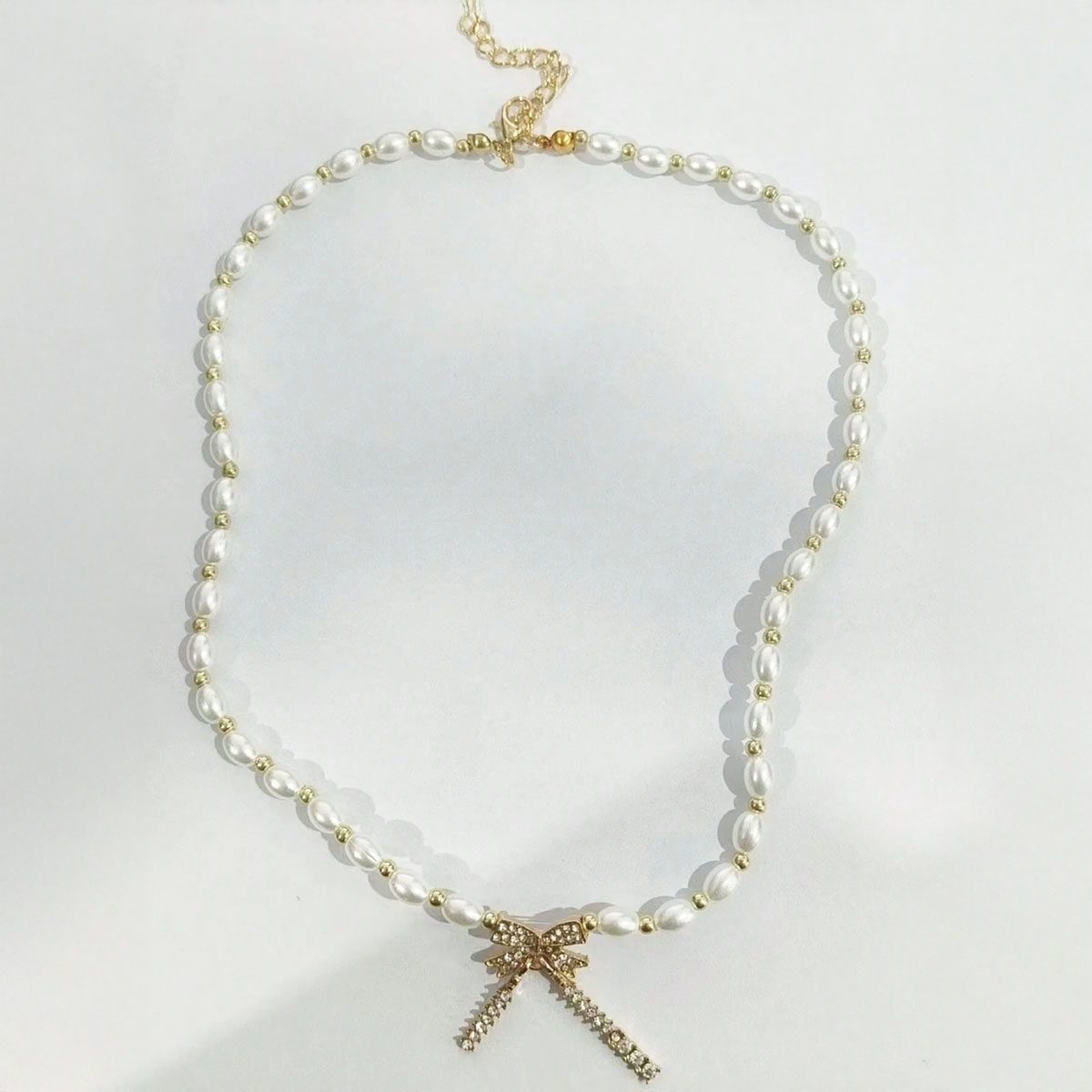 pearl-kolie-me-kremasto-fiogko-NO30771-nocothebrand-2